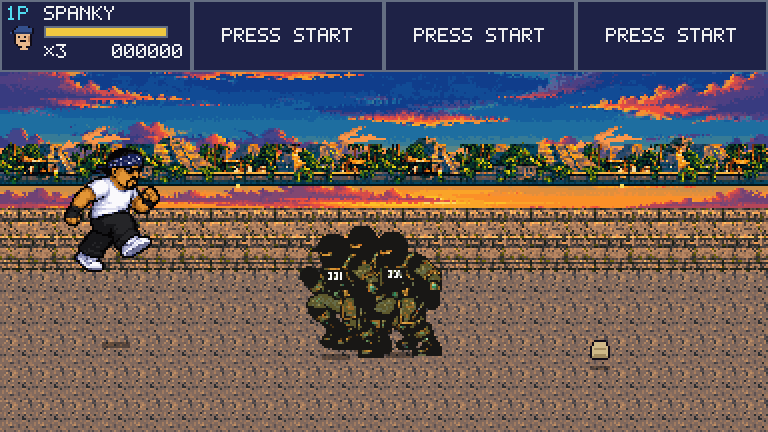 Spanky runs toward a pack of goons at an Aztec sunset